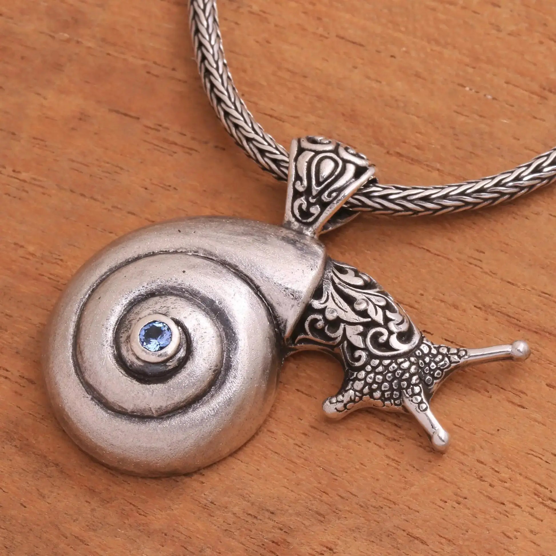 Bunaken Snail - blue topaz pendant necklace - Jewelry
